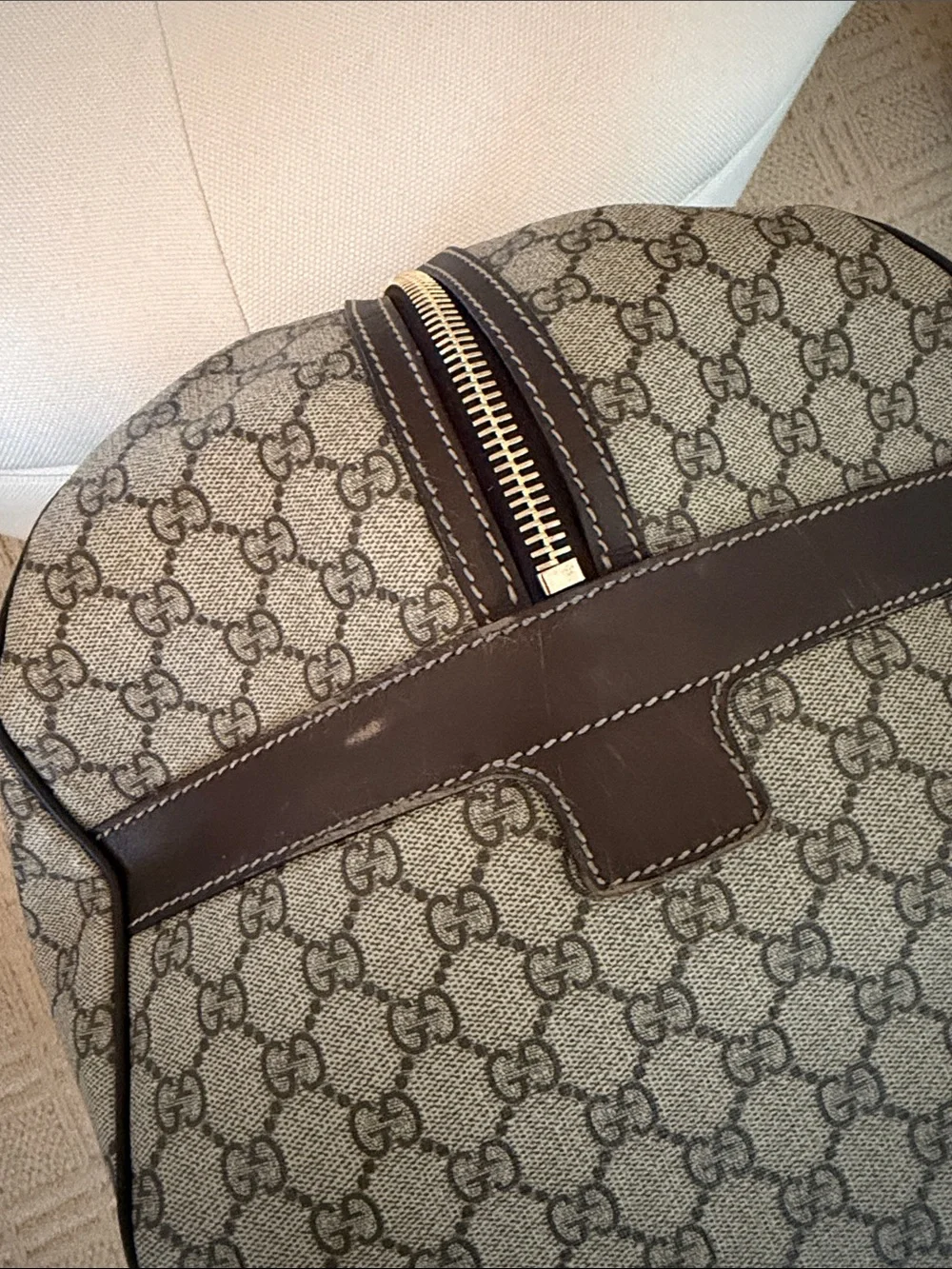 Authentic Gucci Beige Brown GG Supreme Rolling Duffel with Dark Brown Trim